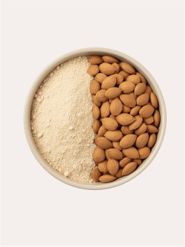 Close-up of raw apricot kernels, the edible seeds extracted from apricot pits, showing their almond-like shape and texture.