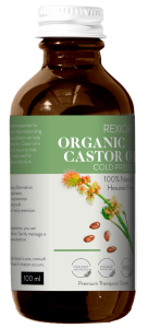 Organic Castor Oil bottle surrounded by castor beans, symbolizing natural beauty and wellness enhancement for skin and hair.